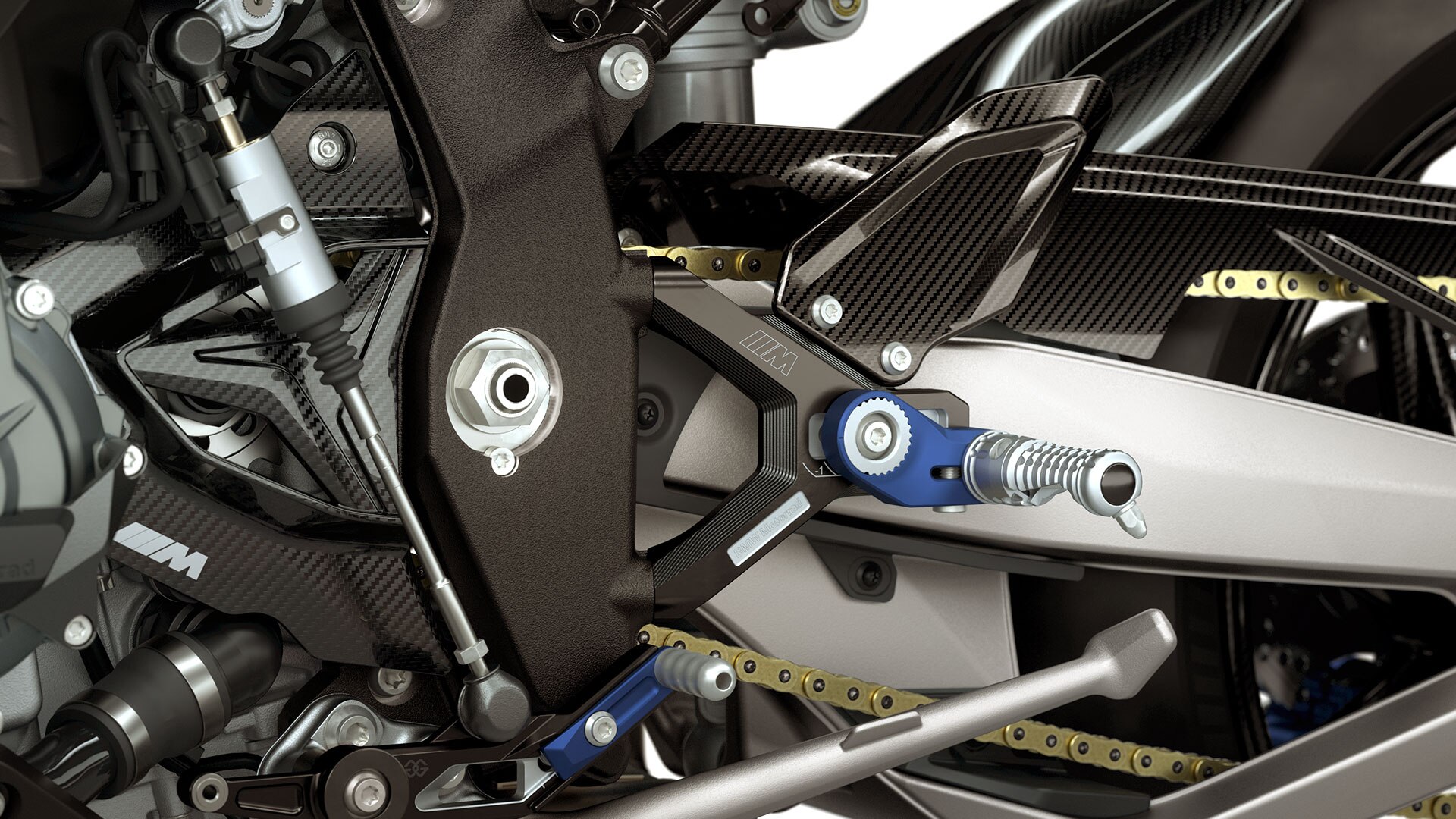 BMW M 1000 RR | BMW Motorrad Türkiye - M RR ayak dayama sisteminin M karbon parçaları ve M frezelenmiş parçaları.